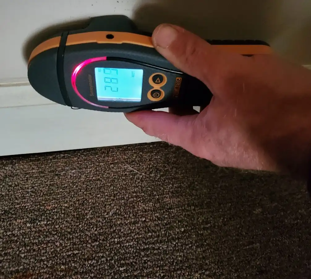 Moisture detection at baseboard during Sewage Cleanup & Sanitation in Oak Hills